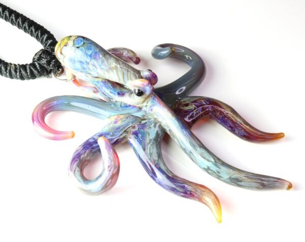 Purple glass spreading octopus pendant